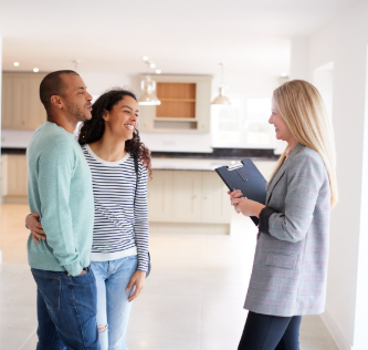 A clerk meeting with tenants in their home
